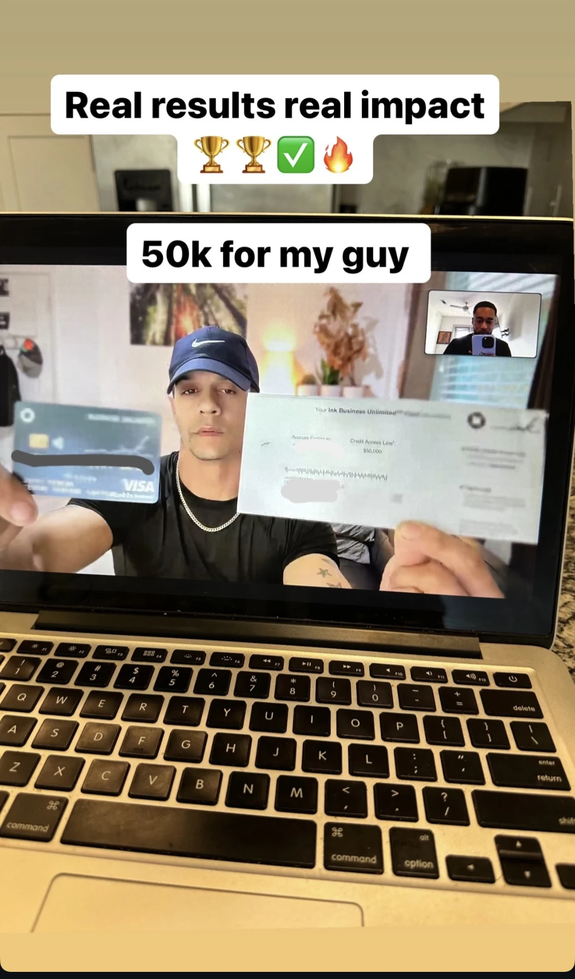 Client on a video call holding a $50,000 Ink Business Unlimited approval letter